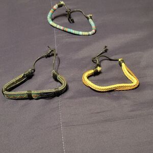 VARIOUS PULL STRING LEATHER BRACELETS